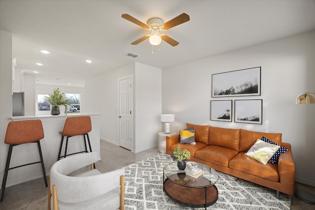 living room with ceiling fan