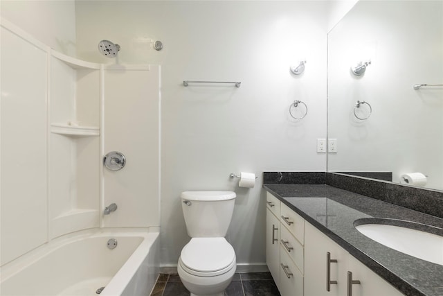 full bathroom with tile patterned flooring, vanity, toilet, and tiled shower / bath