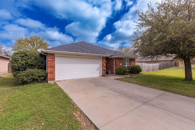 ranch-style home with a garage and a front lawn