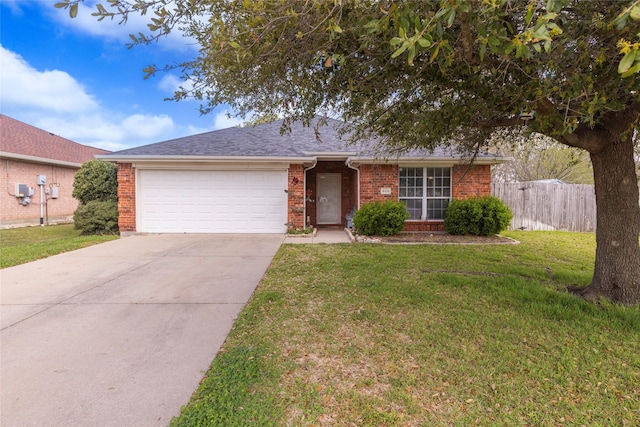 ranch-style house featuring a garage and a front yard