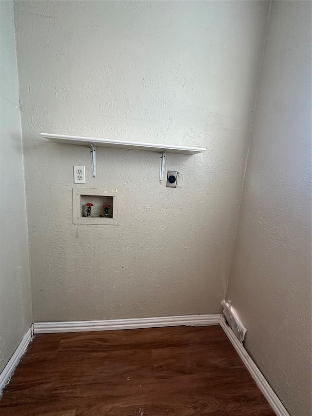 clothes washing area featuring hookup for a washing machine, hookup for an electric dryer, and dark hardwood / wood-style flooring