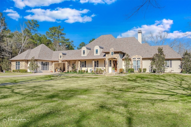 view of front of home with a front yard