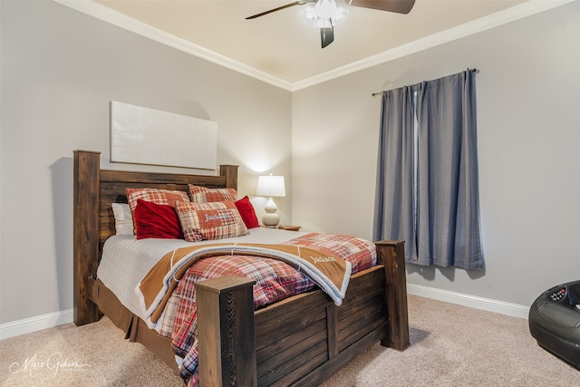 bedroom featuring crown molding, light colored carpet, and ceiling fan