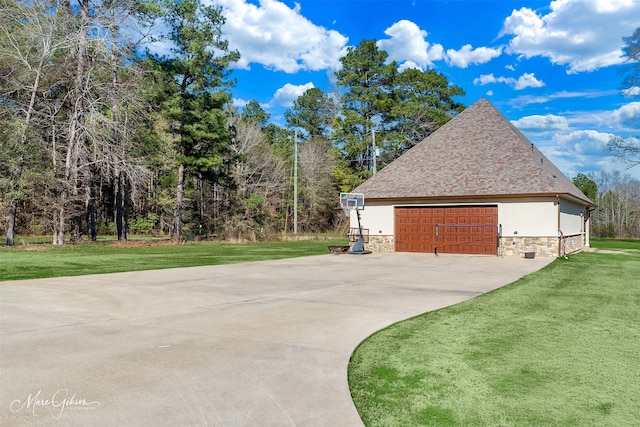 view of property exterior featuring a garage and a lawn