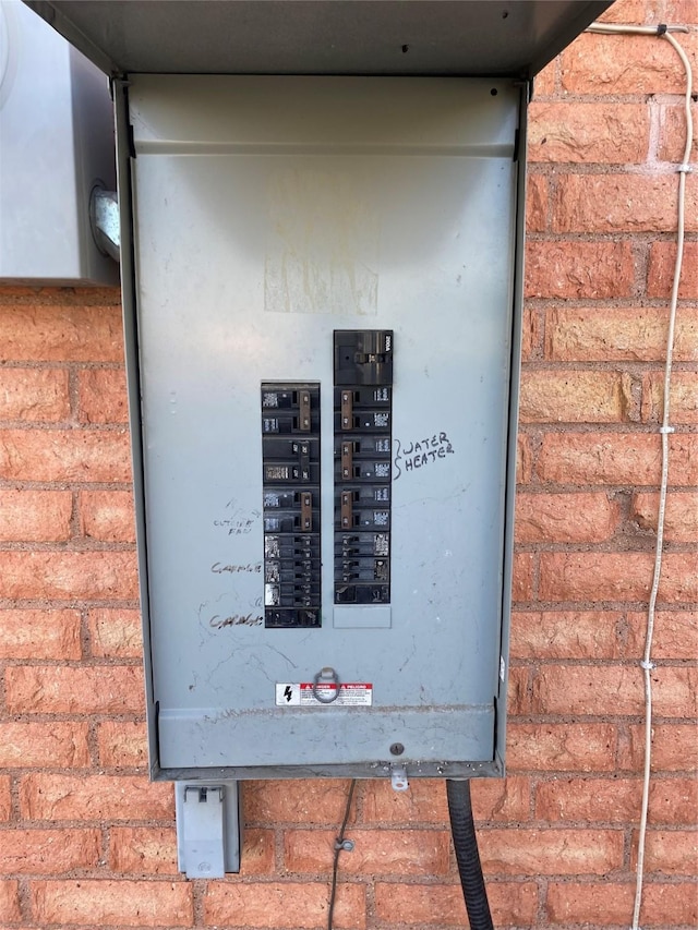 utility room featuring electric panel