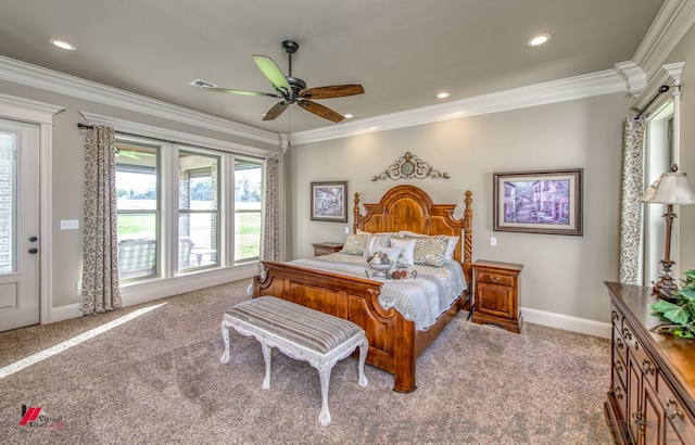 carpeted bedroom with ornamental molding and ceiling fan