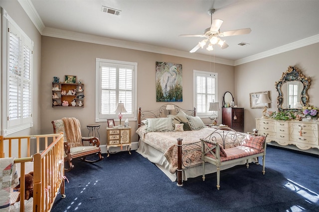 bedroom featuring carpet flooring, ceiling fan, and crown molding