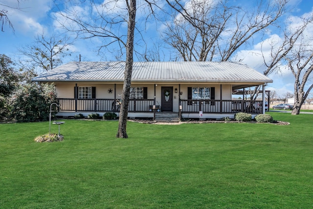 single story home featuring covered porch and a front lawn