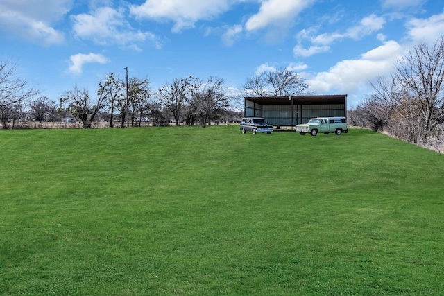 view of yard with a carport