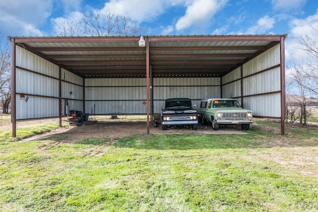 view of parking featuring a yard