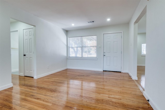 foyer entrance with light wood-type flooring