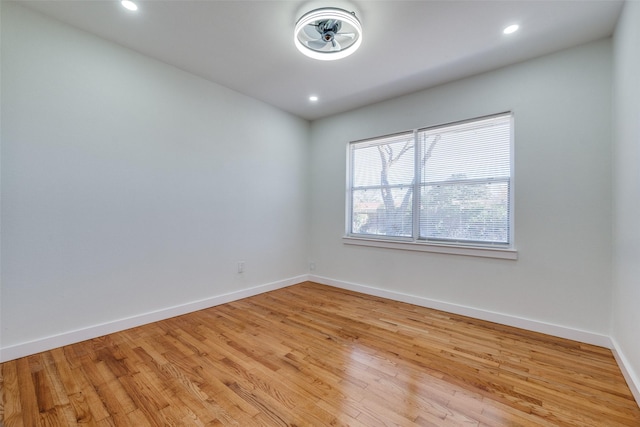 unfurnished room featuring light wood-type flooring