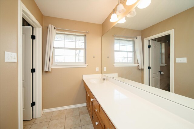 bathroom featuring tile patterned floors and vanity