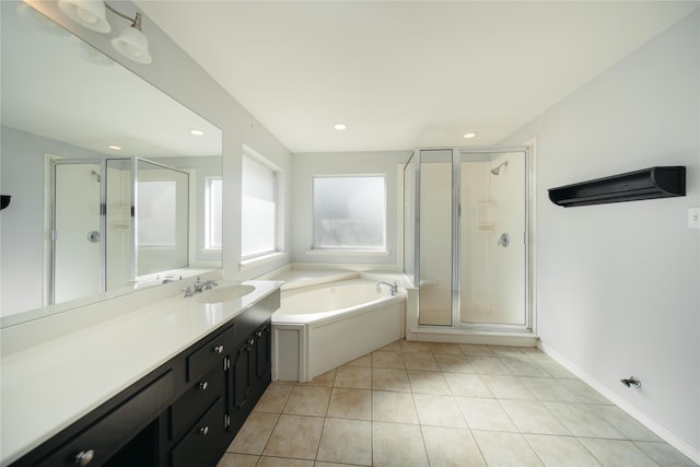 bathroom with vanity, independent shower and bath, and tile patterned flooring