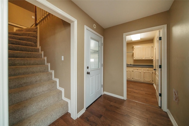 interior space with dark hardwood / wood-style floors