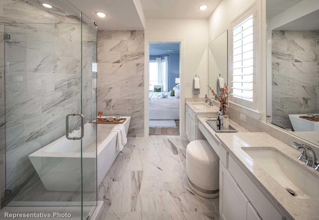 bathroom with vanity, tile walls, and plus walk in shower