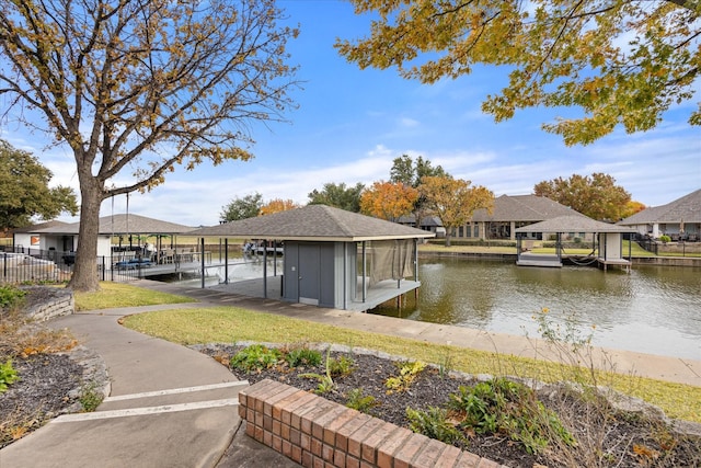 dock area with a water view