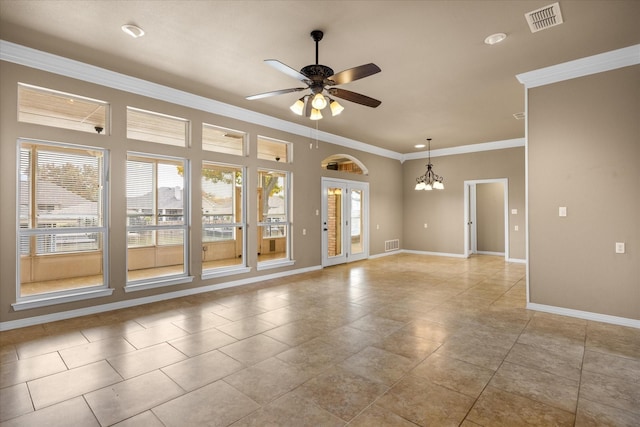 spare room with ceiling fan with notable chandelier, ornamental molding, and light tile patterned flooring