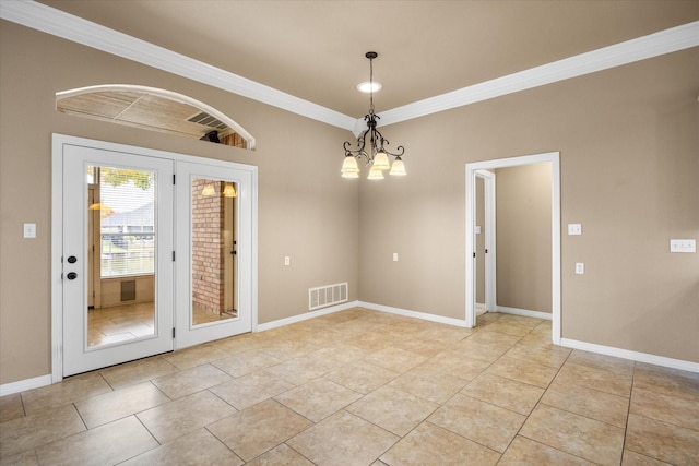 interior space featuring a chandelier and crown molding