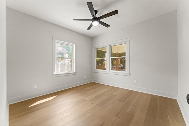 unfurnished room featuring ceiling fan and light wood-type flooring