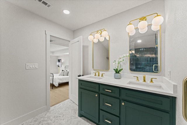 bathroom featuring vanity and wood-type flooring