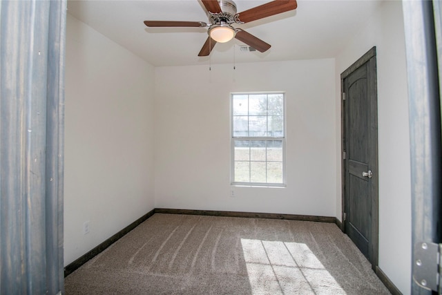 unfurnished room with light colored carpet