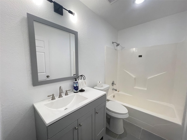 full bathroom featuring tile patterned floors, vanity, shower / bathtub combination, and toilet