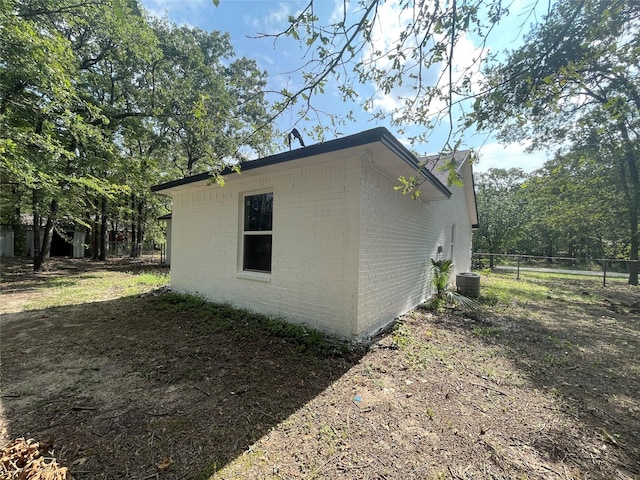 view of property exterior featuring central air condition unit