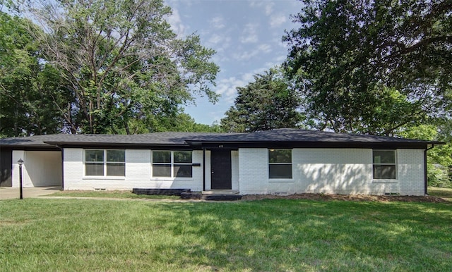 ranch-style house with a front lawn and a carport