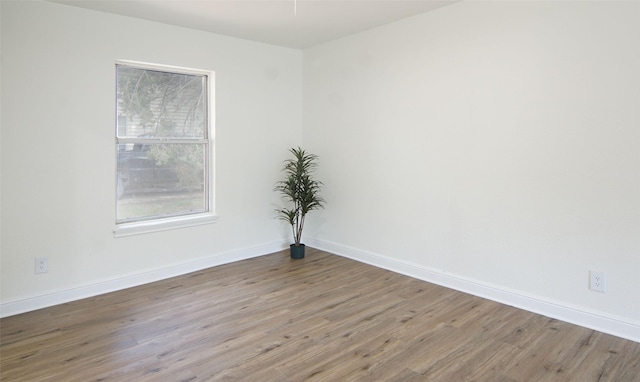 empty room featuring hardwood / wood-style floors