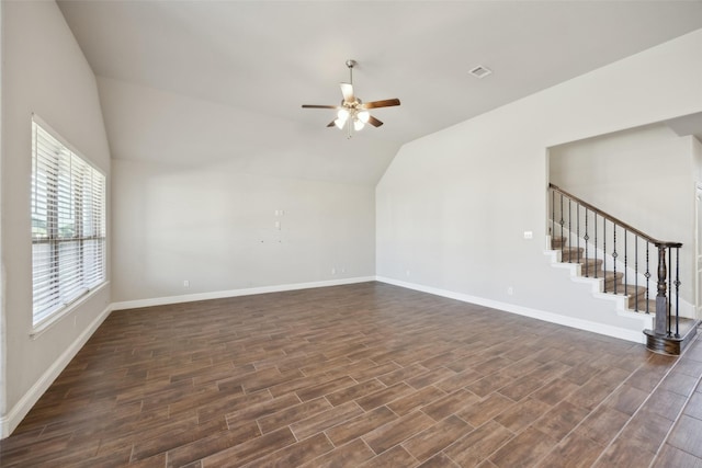 unfurnished living room featuring ceiling fan, lofted ceiling, and dark hardwood / wood-style flooring