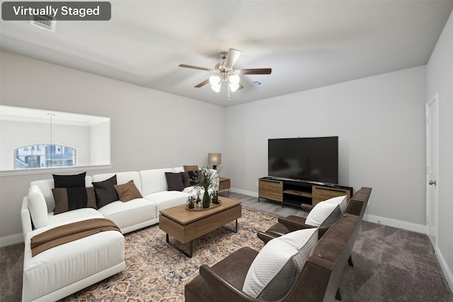 living room with carpet floors and ceiling fan