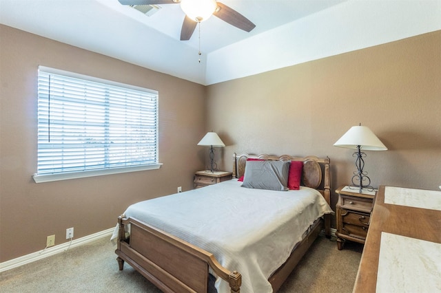 bedroom featuring light carpet, a ceiling fan, visible vents, and baseboards