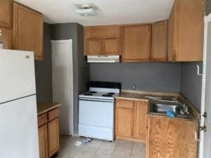 kitchen with white appliances and sink