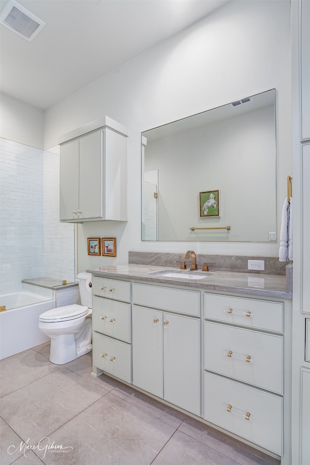 bathroom featuring toilet, tub / shower combination, vanity, and visible vents