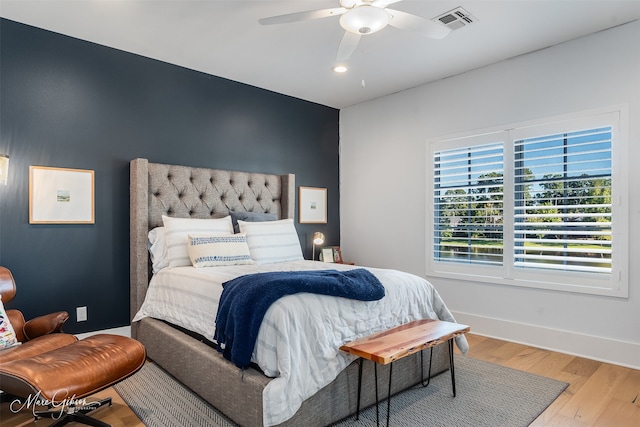 bedroom featuring ceiling fan and light hardwood / wood-style floors