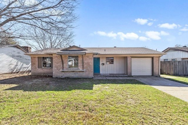 single story home with a garage and a front lawn