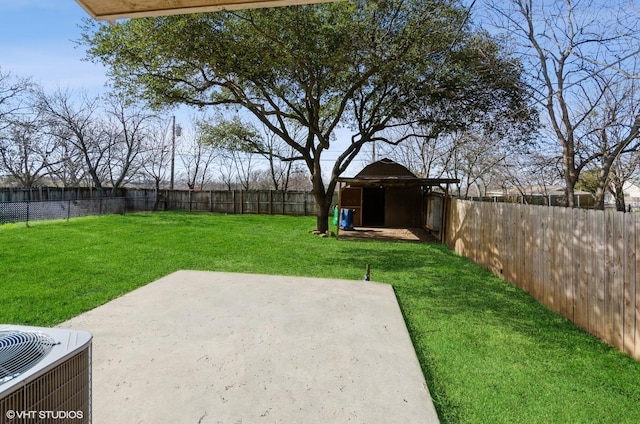 view of yard featuring a patio, a storage unit, and central air condition unit