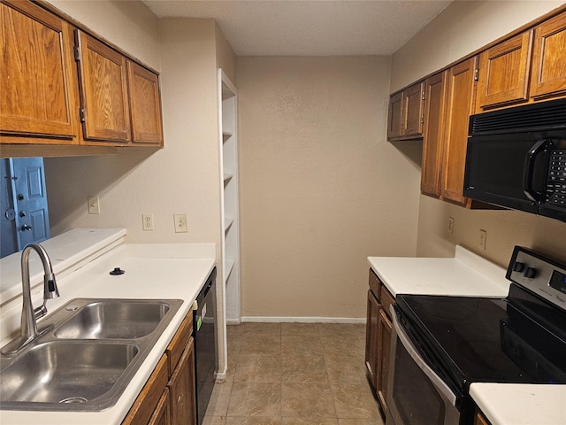 kitchen with black appliances and sink