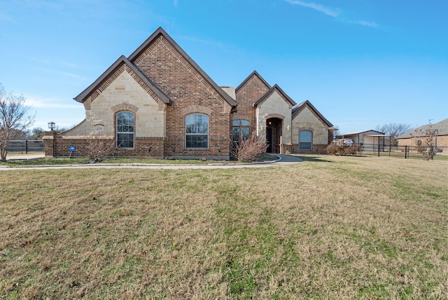 view of front of property with a front lawn