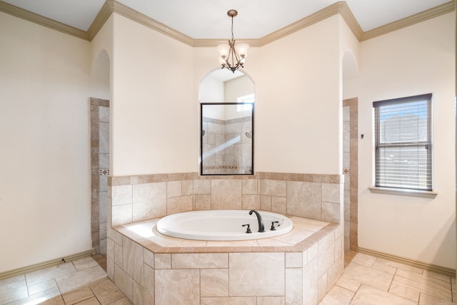 bathroom with ornamental molding, a chandelier, and shower with separate bathtub