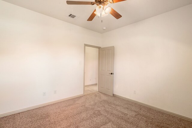 124 Mill Crossing Ln, Springtown, TX 76082 - spare room with vaulted ceiling, carpet floors, and a ceiling fan