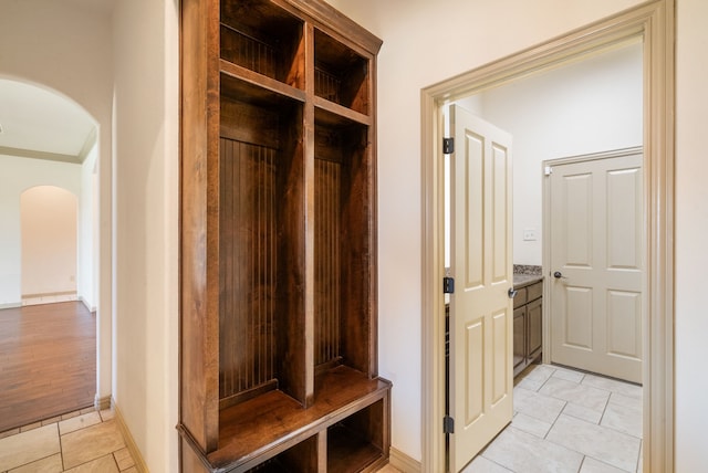 mudroom with light tile patterned floors