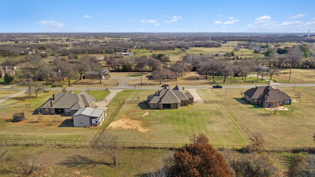 124 Mill Crossing Ln, Springtown, TX 76082 - french provincial home with a front lawn, stone siding, a chimney, fence, and brick siding