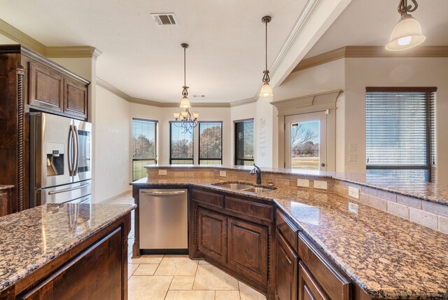124 Mill Crossing Ln, Springtown, TX 76082 - kitchen with decorative backsplash, arched walkways, stainless steel range with electric stovetop, and a sink