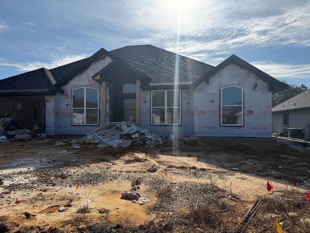 property under construction featuring central air condition unit