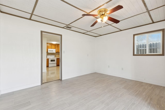 spare room featuring ceiling fan