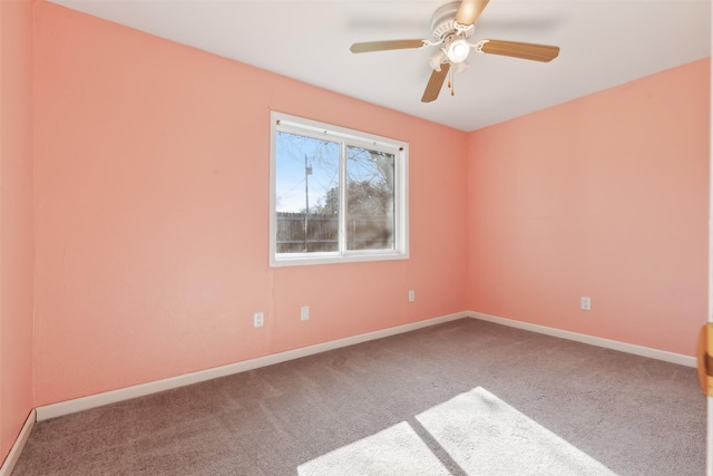 carpeted empty room with ceiling fan