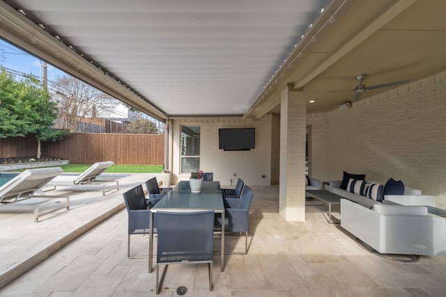 view of patio with ceiling fan