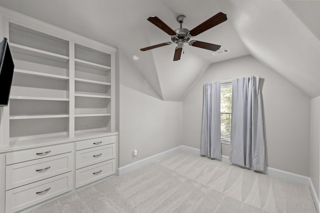 bonus room featuring ceiling fan, light colored carpet, and lofted ceiling